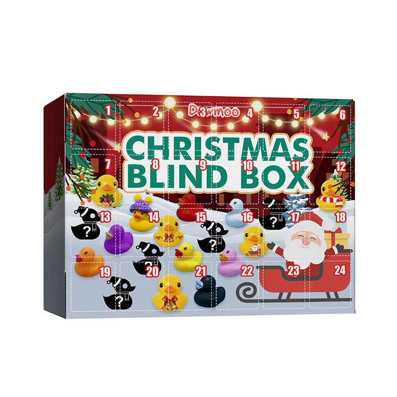 Åpen adventskalender viser mangfoldet av 24 fargerike gummiender, klar for barnas lek.