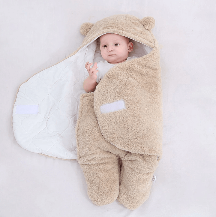 Detaljbilde av den myke ullteksturen på baby soveposen.
