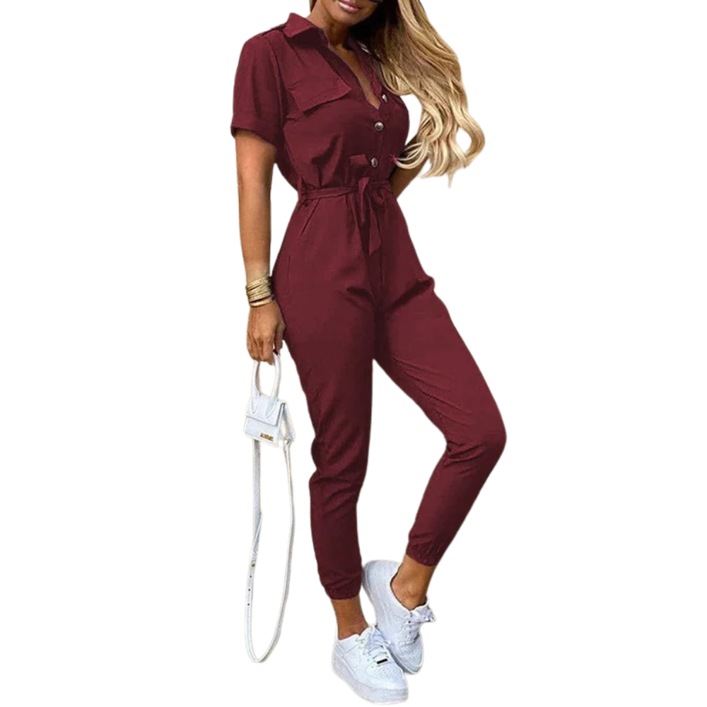 Monokromatisk beltejumpsuit for kvinner, slankende silhuett og komfortabel passform.
