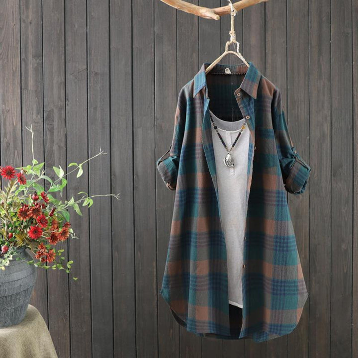Rød, langermet kvinners tunikabluse med elegant design, perfekt som motebluse og kontorantrekk.