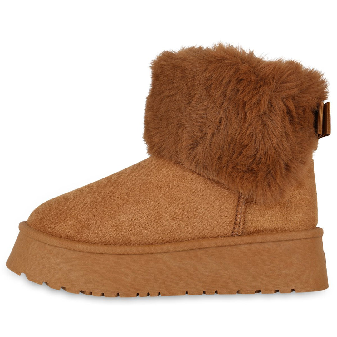 Moteriktige fluffy damestøvler, gir ultimat komfort. Perfekte varme og sklisikre sko for vinterbruk.