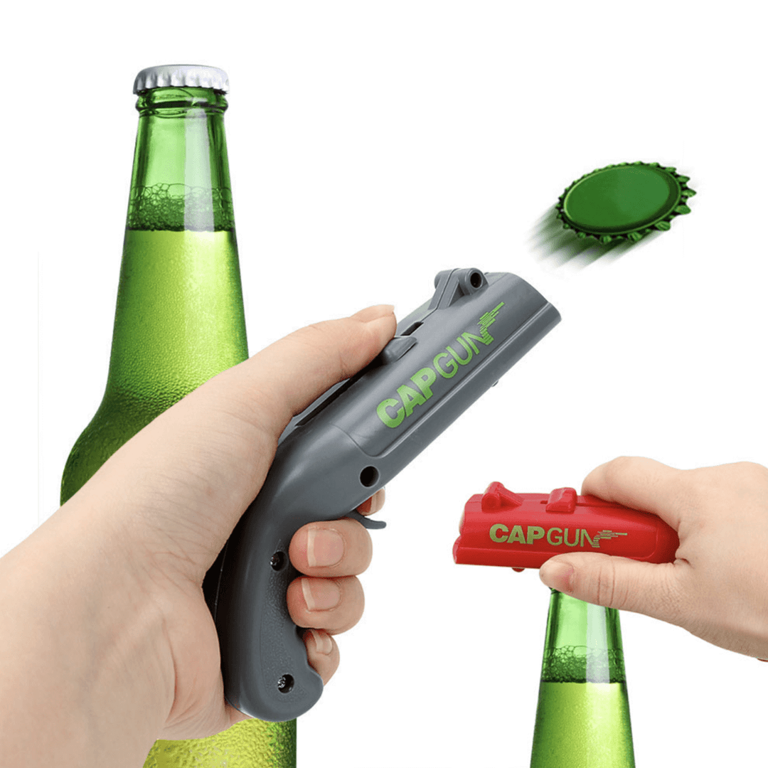Flaskeåpner korkpistol skyter korker; et festlig leketøy og kjøkkenutstyr i rød og grå.