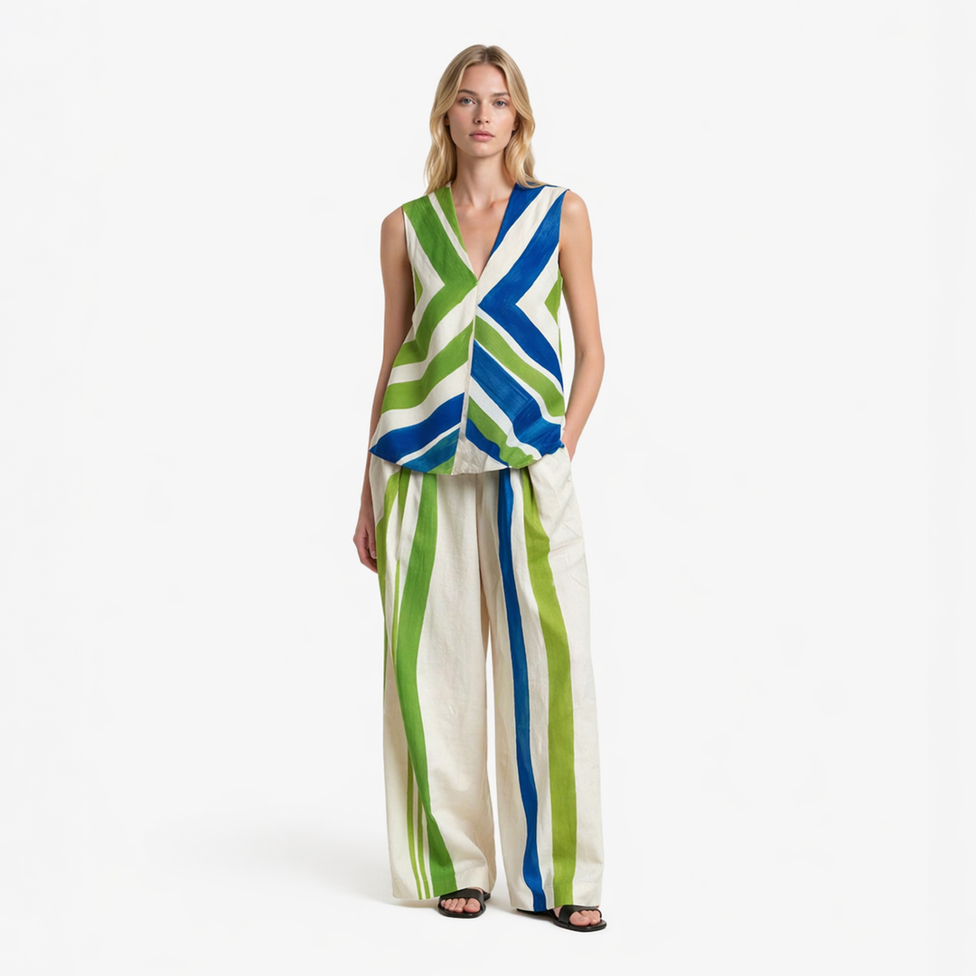 Stripet dame singlet med V-hals. Komfortabel, ermeløs topp i kontrastfarger, perfekt for sommer og casual bruk.