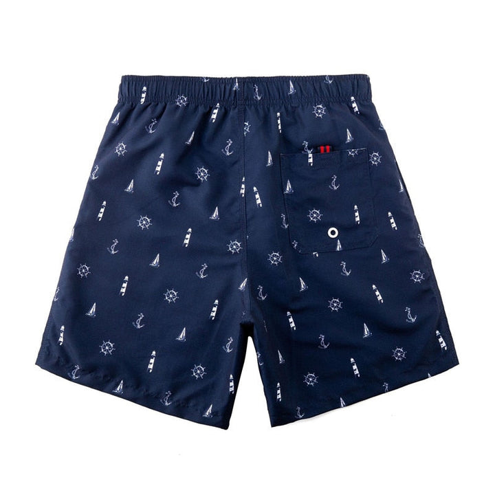 Mønstret, hurtigtørkende badeshorts for menn, utmerket for sommer, strand og ferieturer.