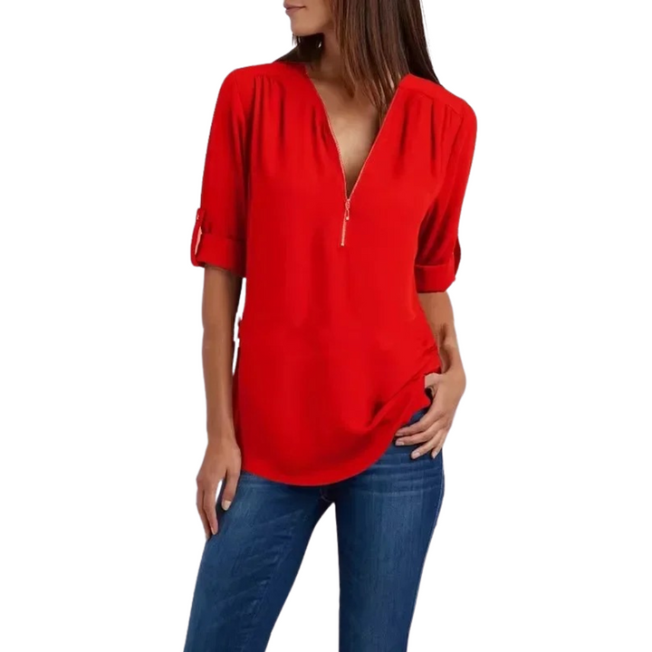 Myk v-halsbluse til dame, allsidig og tidsriktig for enhver garderobe.