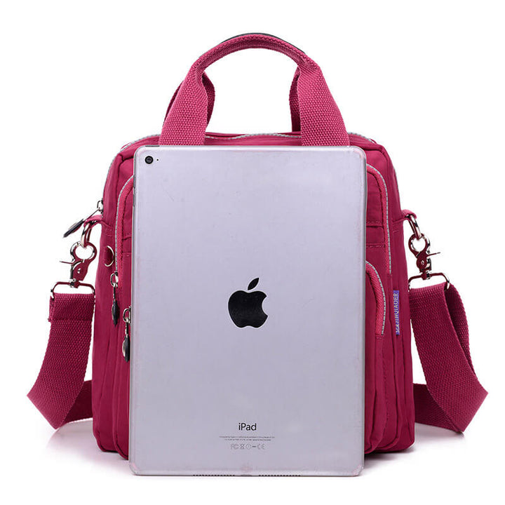 Kvinners fritidsveske i vanntett nylon, funksjonell crossbody for fritiden.