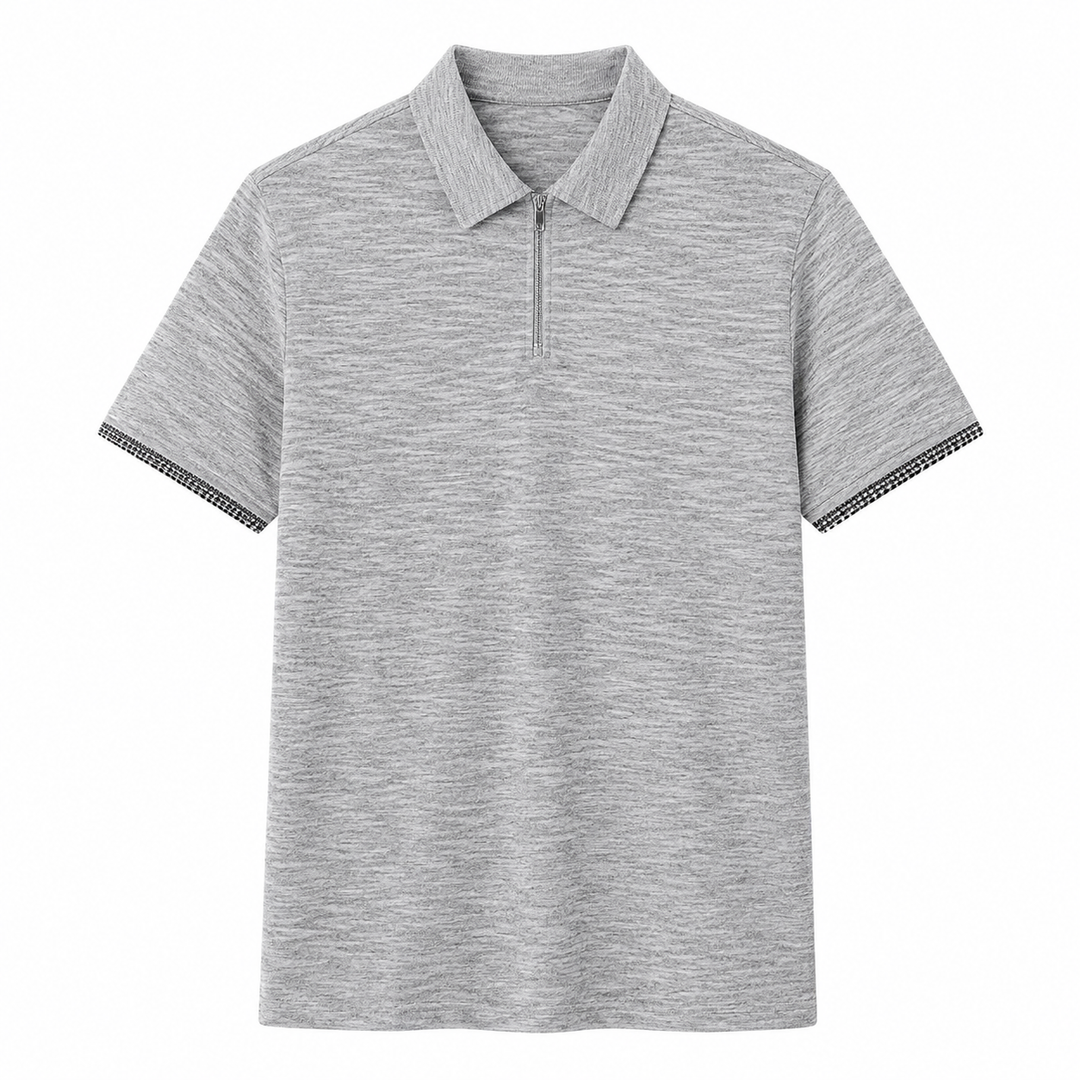 Elegant herrepolo med halv glidelås og subtile rutete detaljer. En allsidig og pustende sommerskjorte.