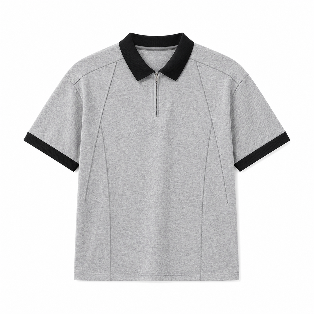 Stilig herre half-zip polo i bomull, perfekt for business casual eller fritid. Kortermet med kontrastkrage.