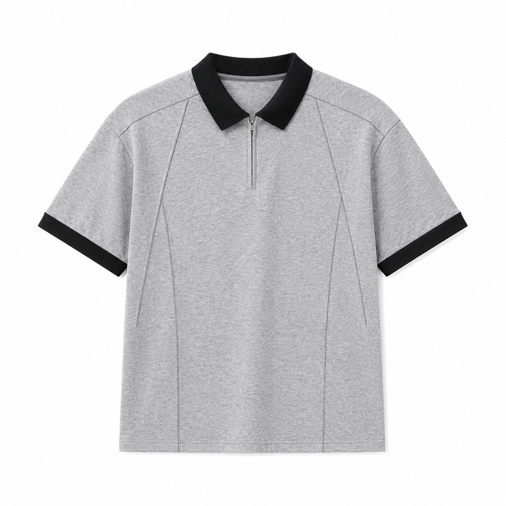 Stilig herre half-zip polo i bomull, perfekt for business casual eller fritid. Kortermet med kontrastkrage.