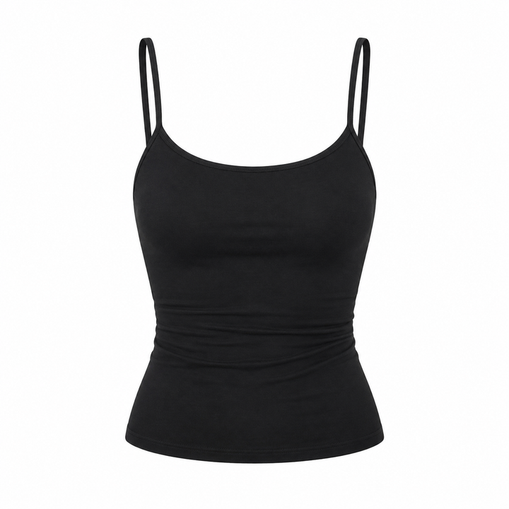 Trendy, ensfarget crop topp for kvinner med tynne spagettistropper. Perfekt for sommer, casual og trendy hverdagsstil.