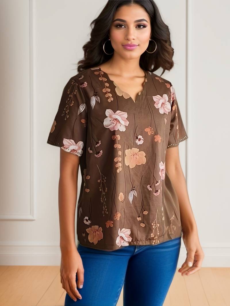 Stilig blomsterbluse for kvinner, kombinerer komfort med moderne estetikk.