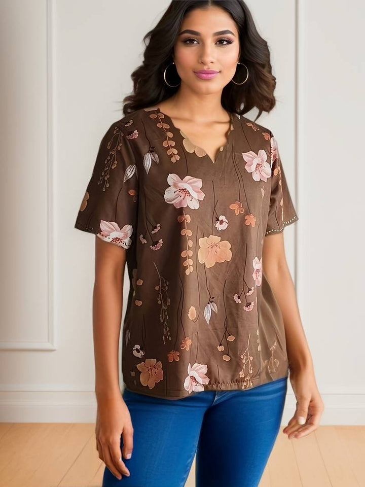 Stilig blomsterbluse for kvinner, kombinerer komfort med moderne estetikk.