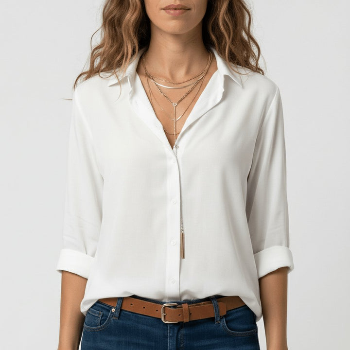 Uformell langermet dameskjorte med knapper, ideell for en avslappet look.