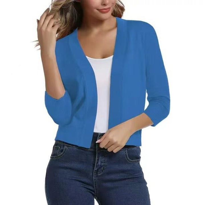 Vårcardigan for dame, 3/4-ermer, åpen front, perfekt for overgangsvær og komfort.