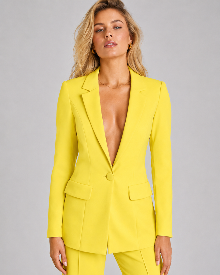 Business kvinne dresser; komplett blazer og buksesett for en profesjonell kontorlook.