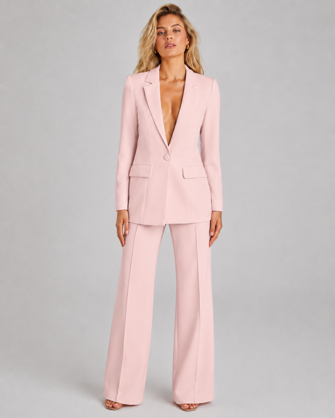 Profesjonelt dame buksesett med matchende blazer, perfekt for jobb og forretningsmøter.