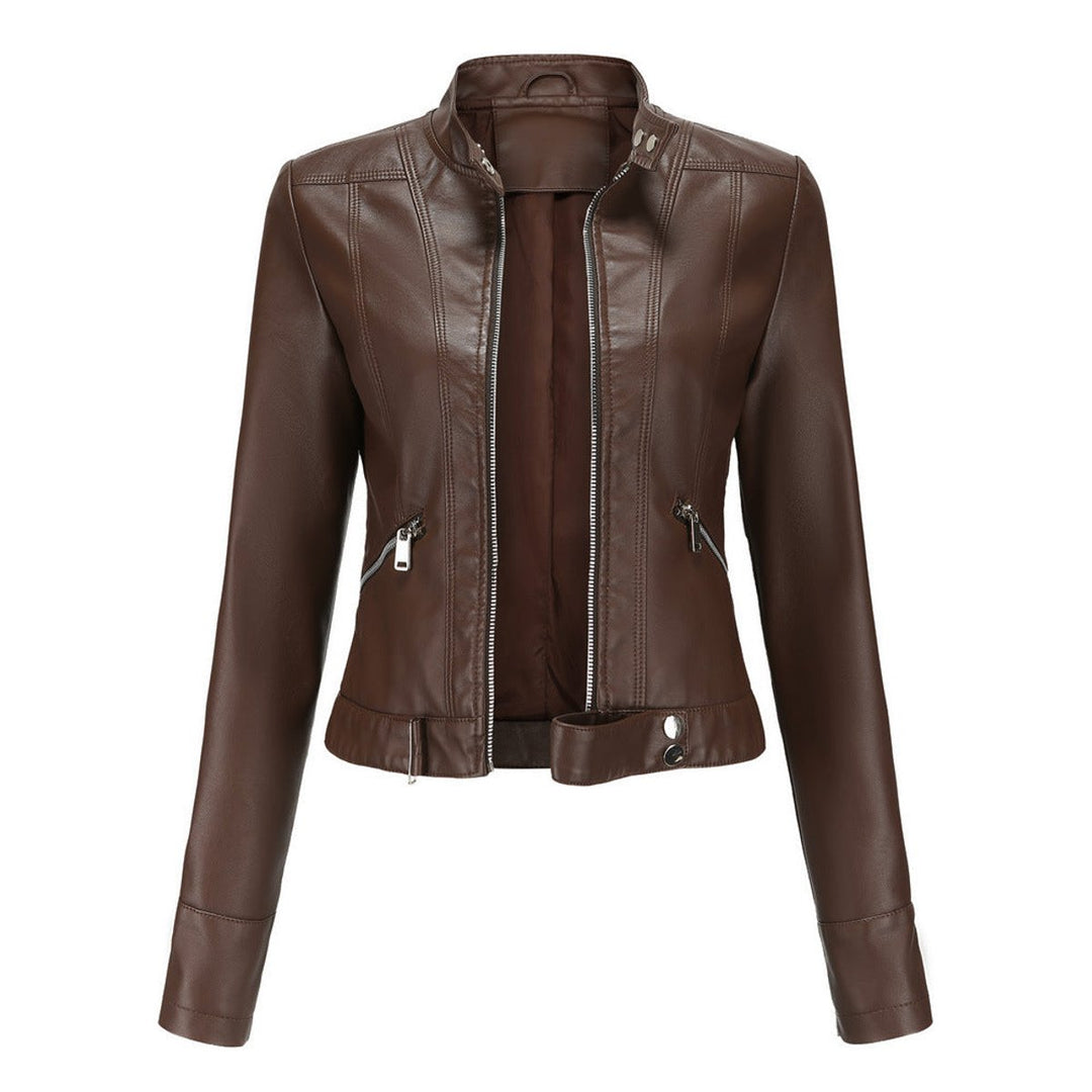 Trendy cropped jakke for dame i mykt kunstskinn, klassisk biker-stil med glidelåser og krage.