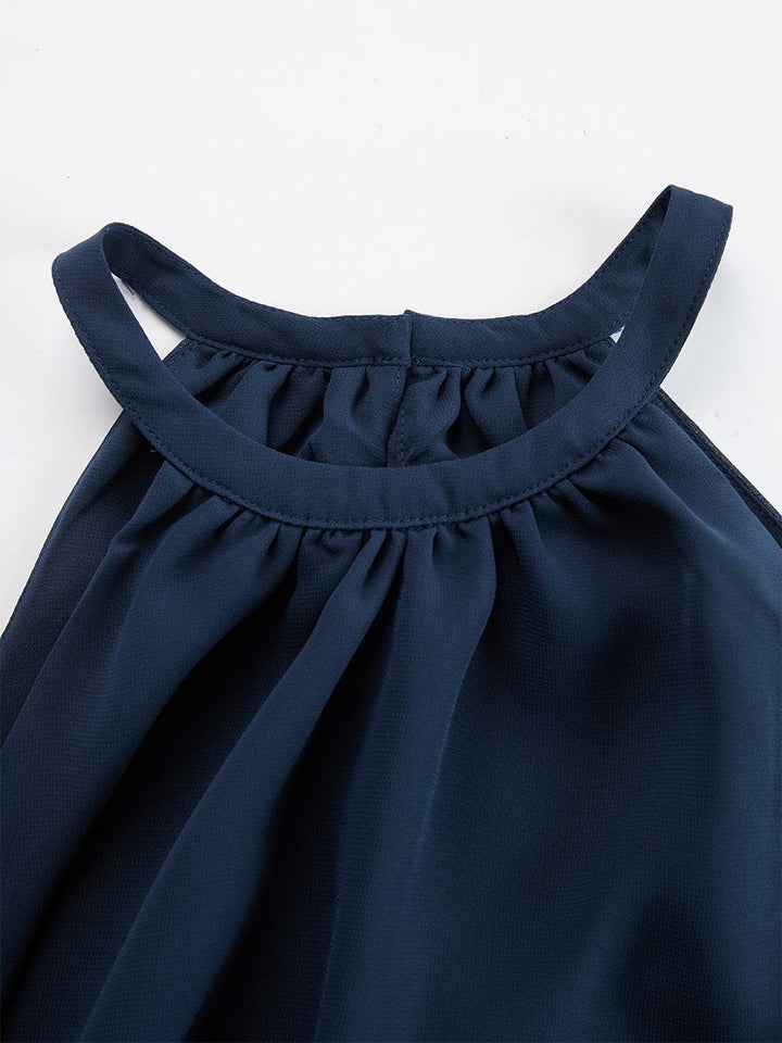Allsidig marineblått halterneck sett for kvinner. Todelt, vidbenet, og elegant for ulike anledninger.