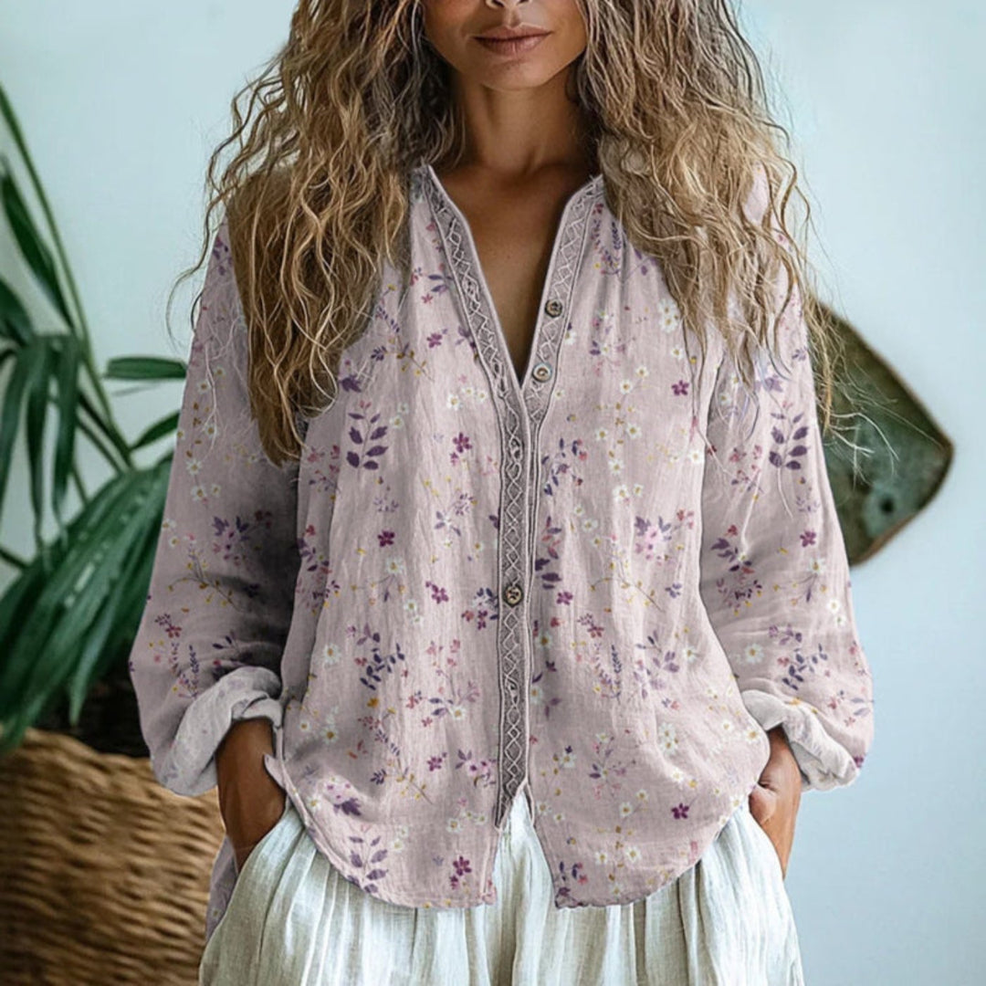 Avslappet linbluse med knappelukking, mønstret blomstertrykk og oversized passform for damer.