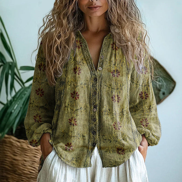 Stilig casual damebluse i lin med V-hals og lang erm, dekorert med vakkert blomstertrykk.