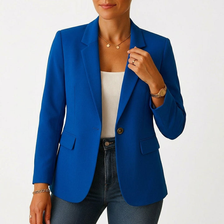 Allsidig kvinneblazer med enkeltknapp. Passer til kontor, fest og formelle settinger. Klassisk design.