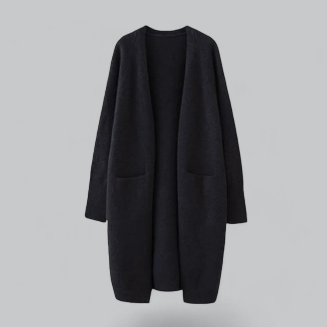 Komfortabel oversized lang cardigan for kvinner i myk og varm kashmirblanding. Perfekt for vinteren.