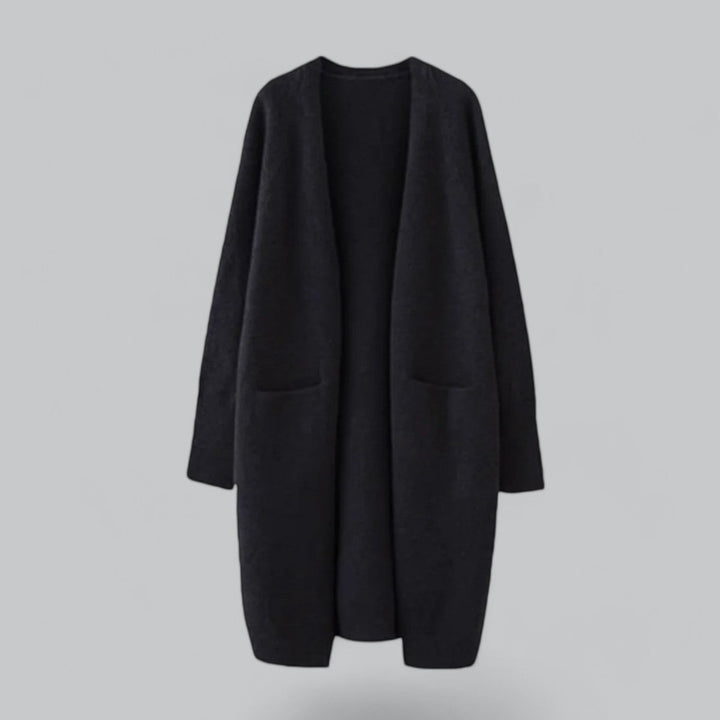 Komfortabel oversized lang cardigan for kvinner i myk og varm kashmirblanding. Perfekt for vinteren.