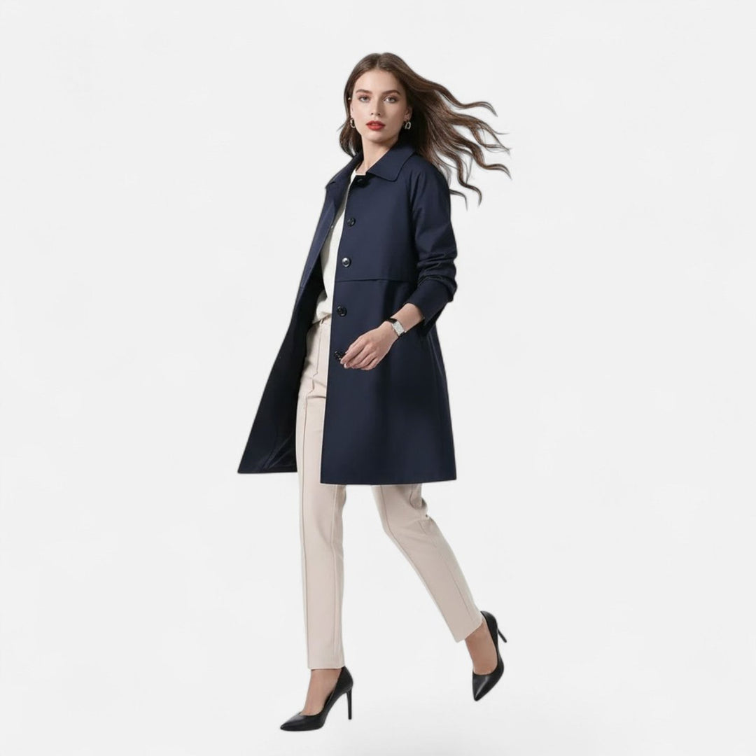 Dobbeltspent midi trenchcoat for kvinner, en tidløs klassiker. Elegant ytterjakke som passer enhver anledning.