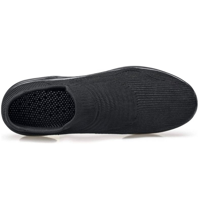 Helsefremmende svarte slip-on sneakers for dame. Ortopediske med minneskum for føttenes velvære.
