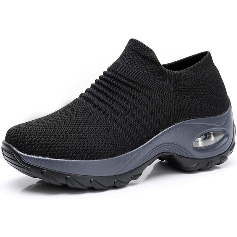 Svarte ortopediske slip-on sneakers for dame med minneskum. Komfortsko til hverdag og arbeid.
