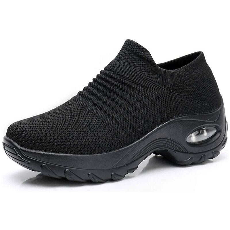 Enkle slip-on sneakers for kvinner i svart. Ortopedisk minneskum gir komfort hele dagen.