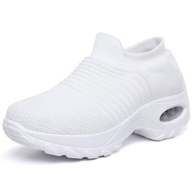 Støttende ortopediske kvinnesko, svarte slip-on sneakers med minneskum for god støtdemping.