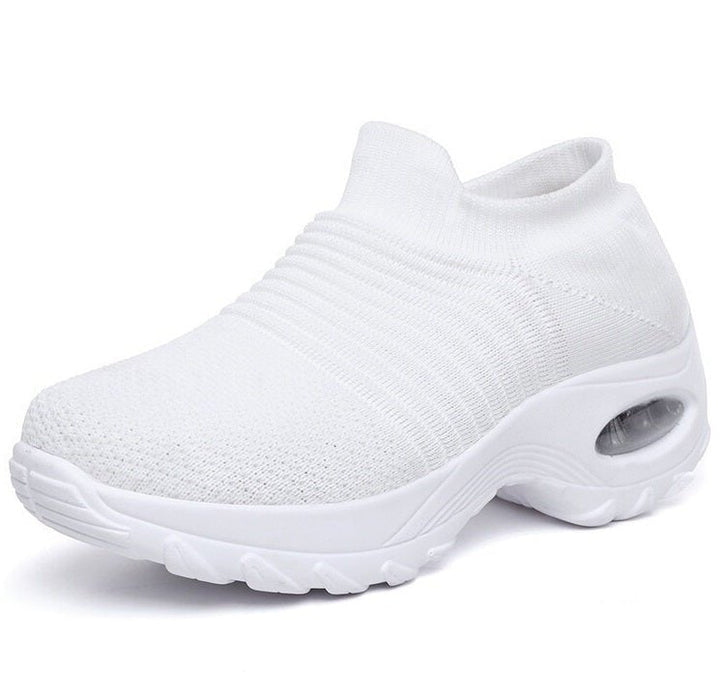 Støttende ortopediske kvinnesko, svarte slip-on sneakers med minneskum for god støtdemping.
