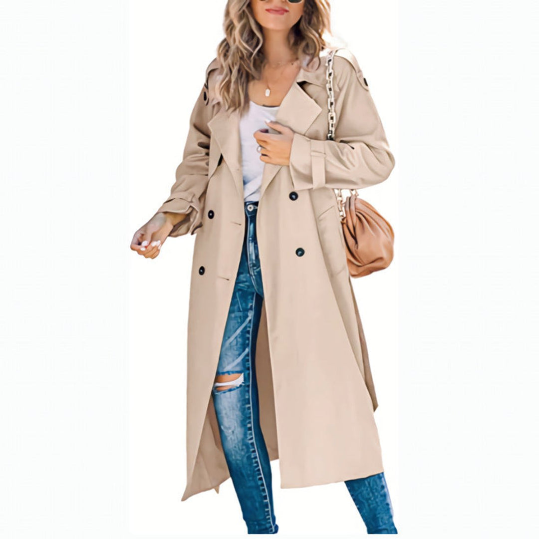 Sidevisning av en elegant oversized trench coat med belte for kvinner. Stilfull og moteriktig.