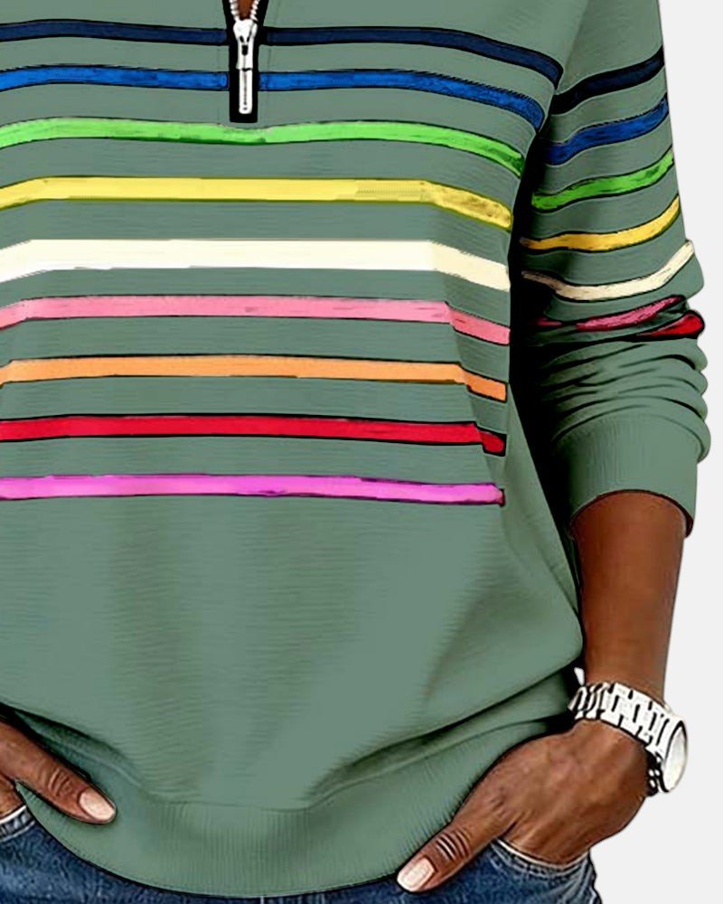 Fargerik, langermet sweatshirt for kvinner, med stripet mønster og elegant glidelås.