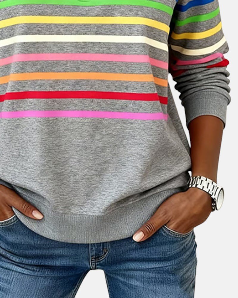 Fargerik og komfortabel sweatshirt til kvinner, stripet design med praktisk glidelås.