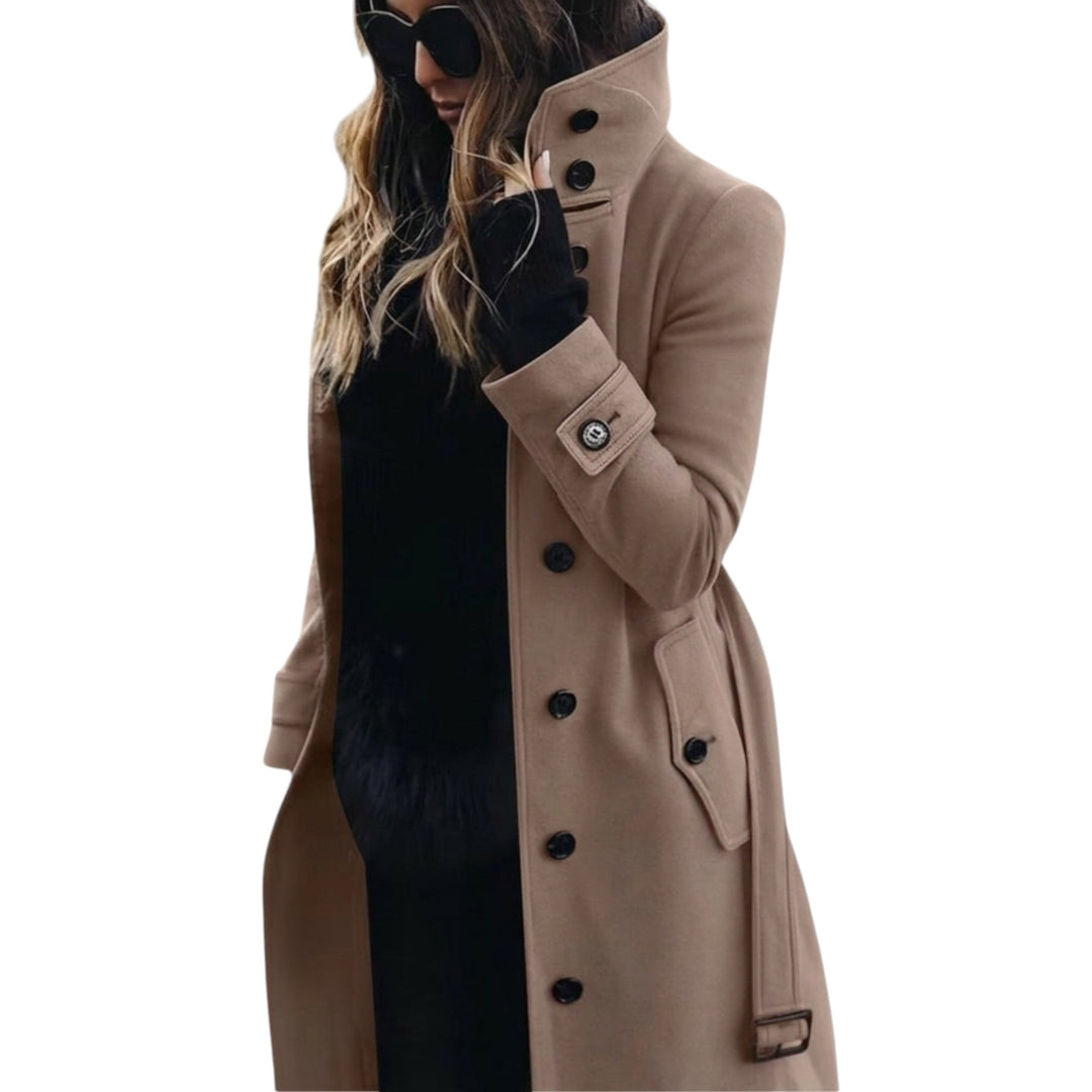 Kvinners elegante trenchcoat i lang modell, ideell som yttertøy for overgangssesongene vår og høst.
