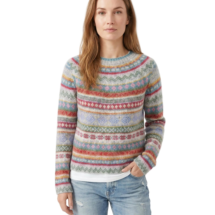 Kvinne vintage strikkegenser med retro design, perfekt for en klassisk og komfortabel høstlook.