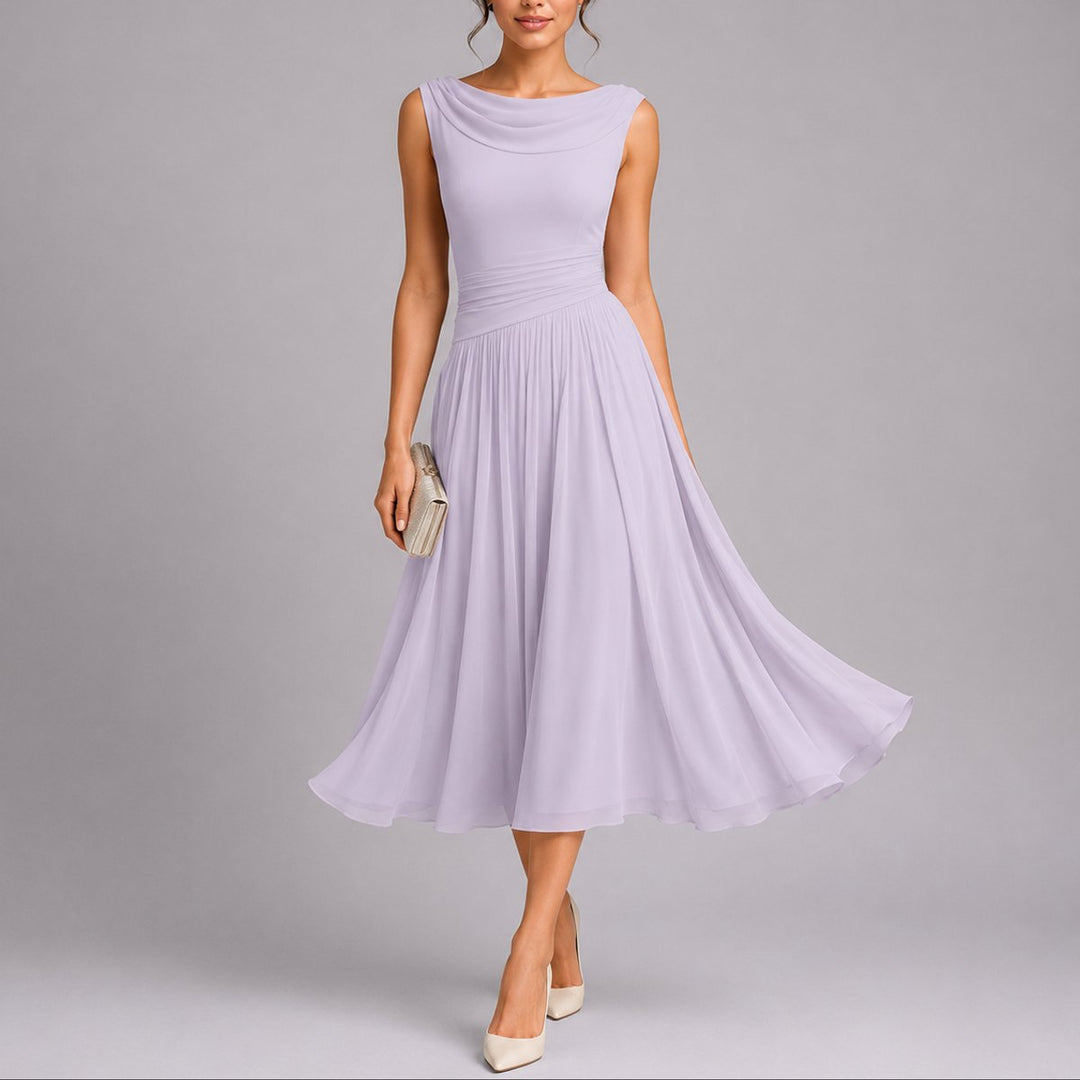 Elegant plissert midikjole for kvinner, perfekt som selskapskjole eller bryllupsgjestkjole til høsten.