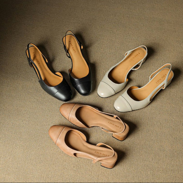 Slingback pumps med stabil blokkhæl, designet for optimal komfort og stil med mandeltå.
