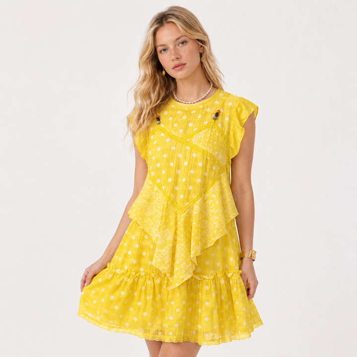 Elegant gul mønstret dame midikjole med vintage prikker og paisleyprint. Perfekt som sommerkjole.