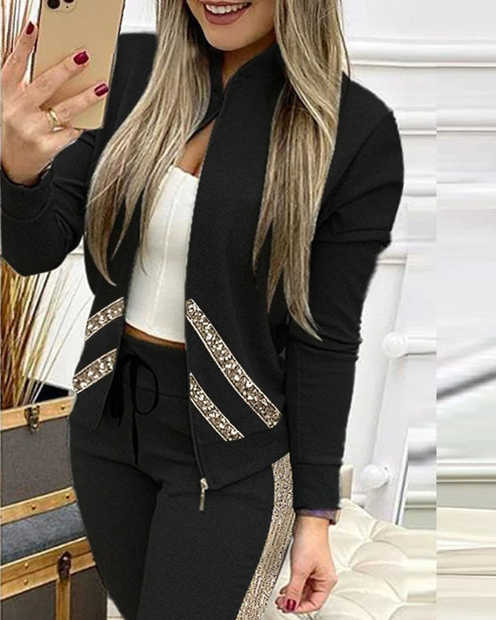 Todelt treningsdress for kvinner, komfortabelt sett med matchende overdel og bukse for elegant fritid.
