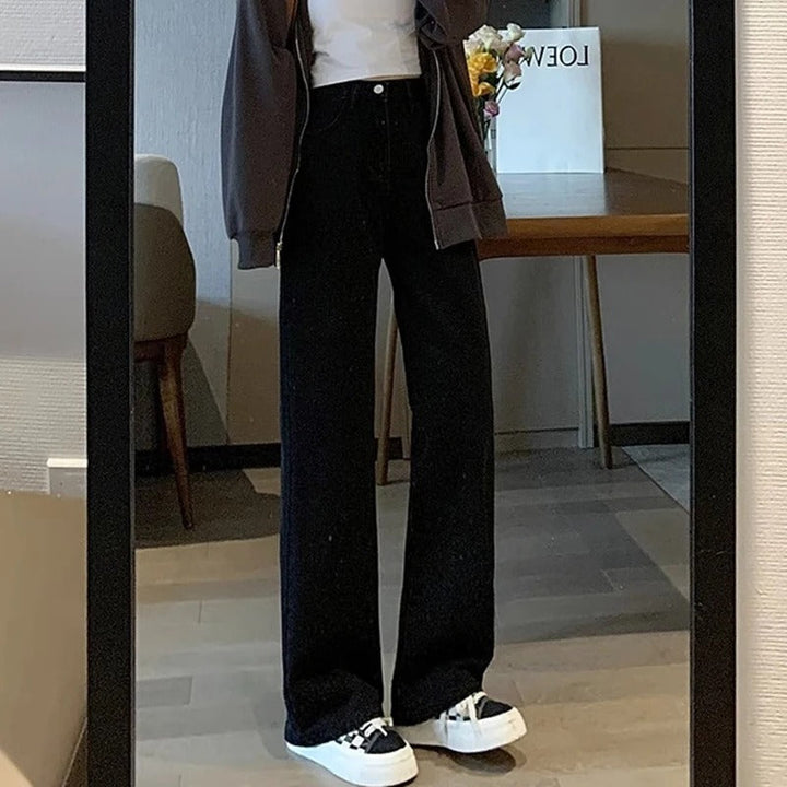 Komfortable blå vintage jeans med vide ben, perfekt for en uformell, men stilfull look.