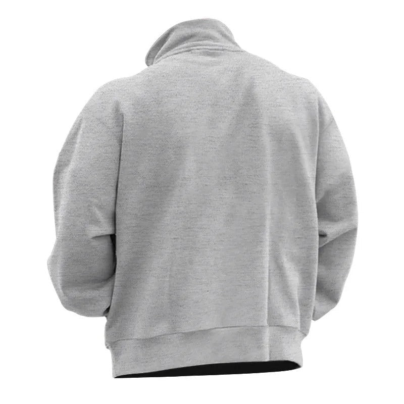 Nærbilde av ståkrage og halv glidelås på menns elegante sweatshirt. Kvalitets herregenser.