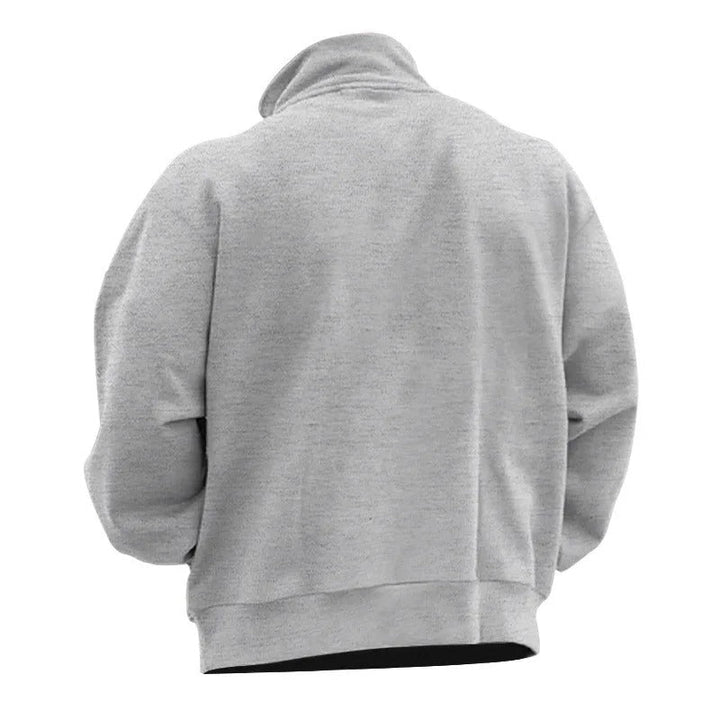 Nærbilde av ståkrage og halv glidelås på menns elegante sweatshirt. Kvalitets herregenser.