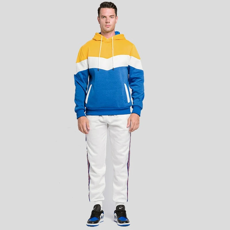 Frontbilde av menns casual patchwork hettegenser, viser unikt design og behagelig passform.