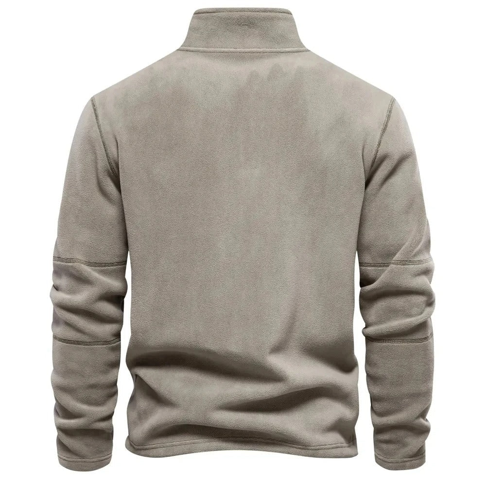 Elegant menns vintergenser med halv glidelås, perfekt for en stilren og varm look i kaldt vær.