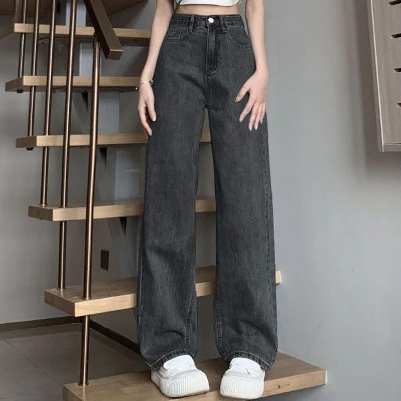 Blå damejeans med vide ben, inspirert av vintage design for en autentisk og trendy look.