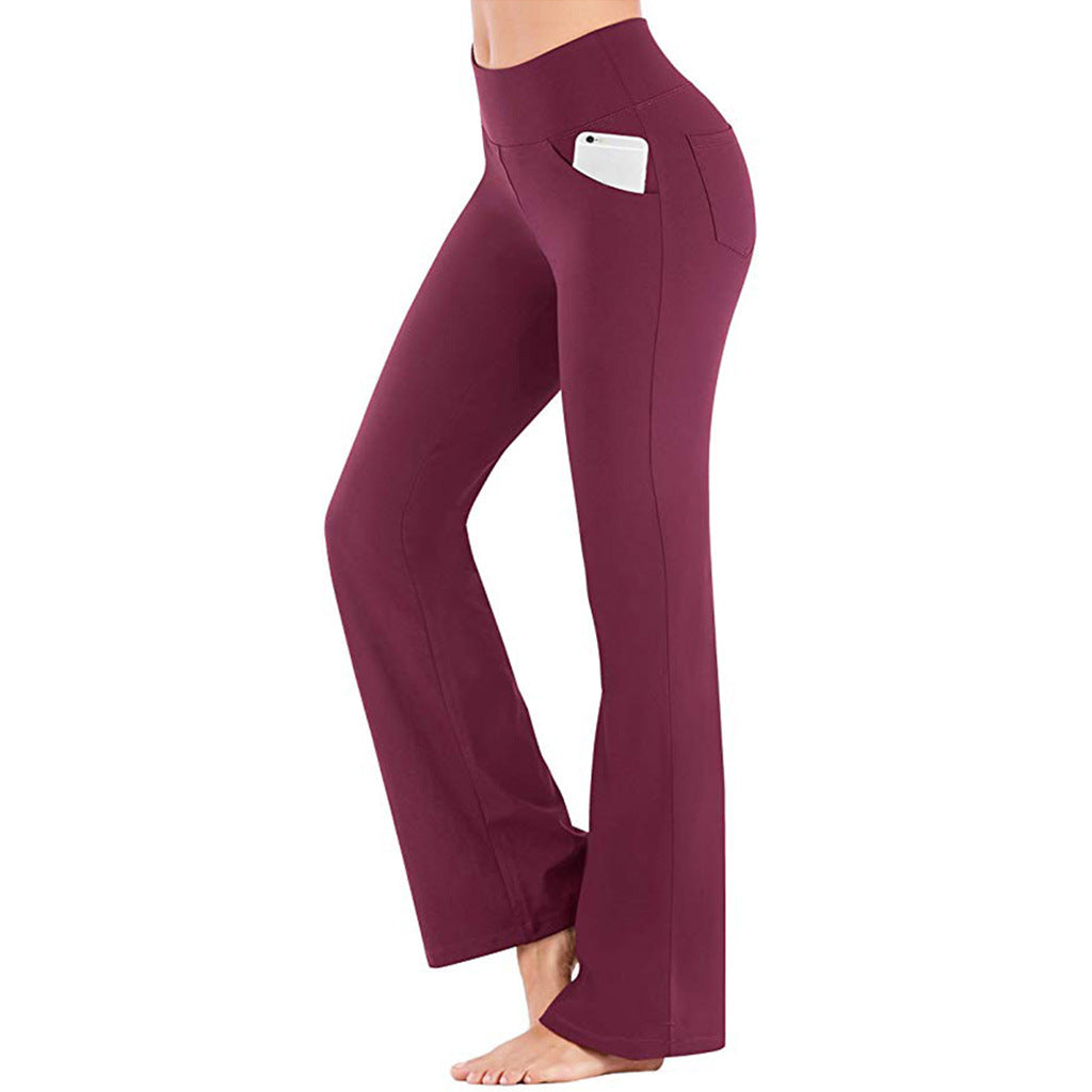 Sideprofil av svarte flaredamebukser med høy midje, egnet for yoga, trening og fritid.