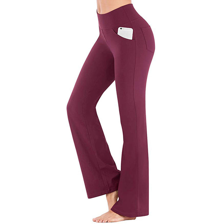Sideprofil av svarte flaredamebukser med høy midje, egnet for yoga, trening og fritid.